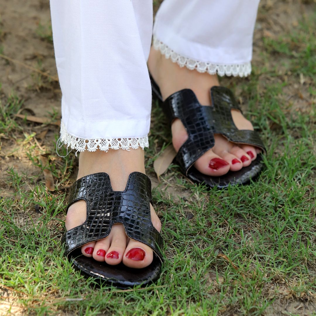 Black store snakeskin slides